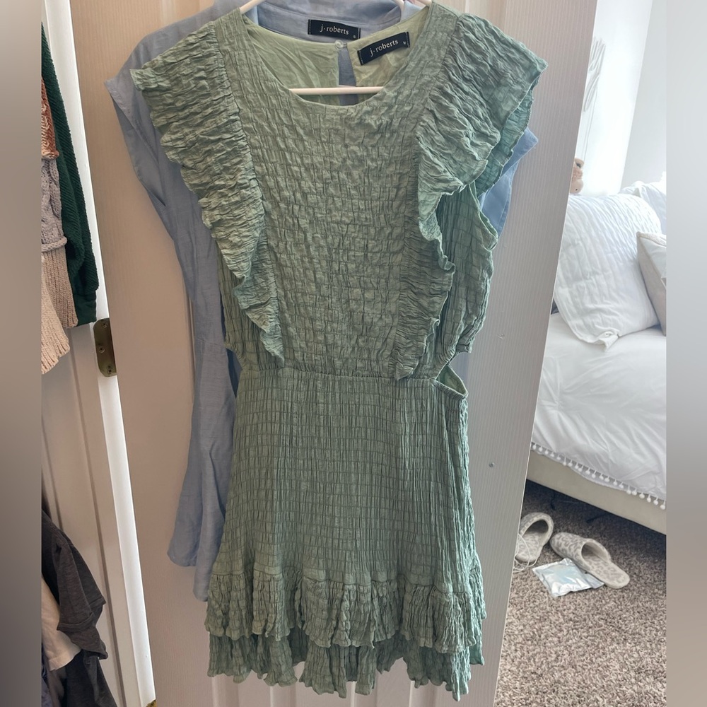 Teal dress with cutouts